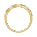 Elegant 10K Yellow Gold Ladies Crossover Ring Featuring Alternating Round And Baguette Diamonds 0.20 Ct. A Modern Fine Jewelry Design For Women. - Image 2