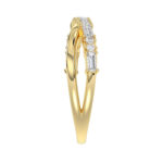 Elegant 10K Yellow Gold Ladies Crossover Ring Featuring Alternating Round And Baguette Diamonds 0.20 Ct. A Modern Fine Jewelry Design For Women. - Image 3